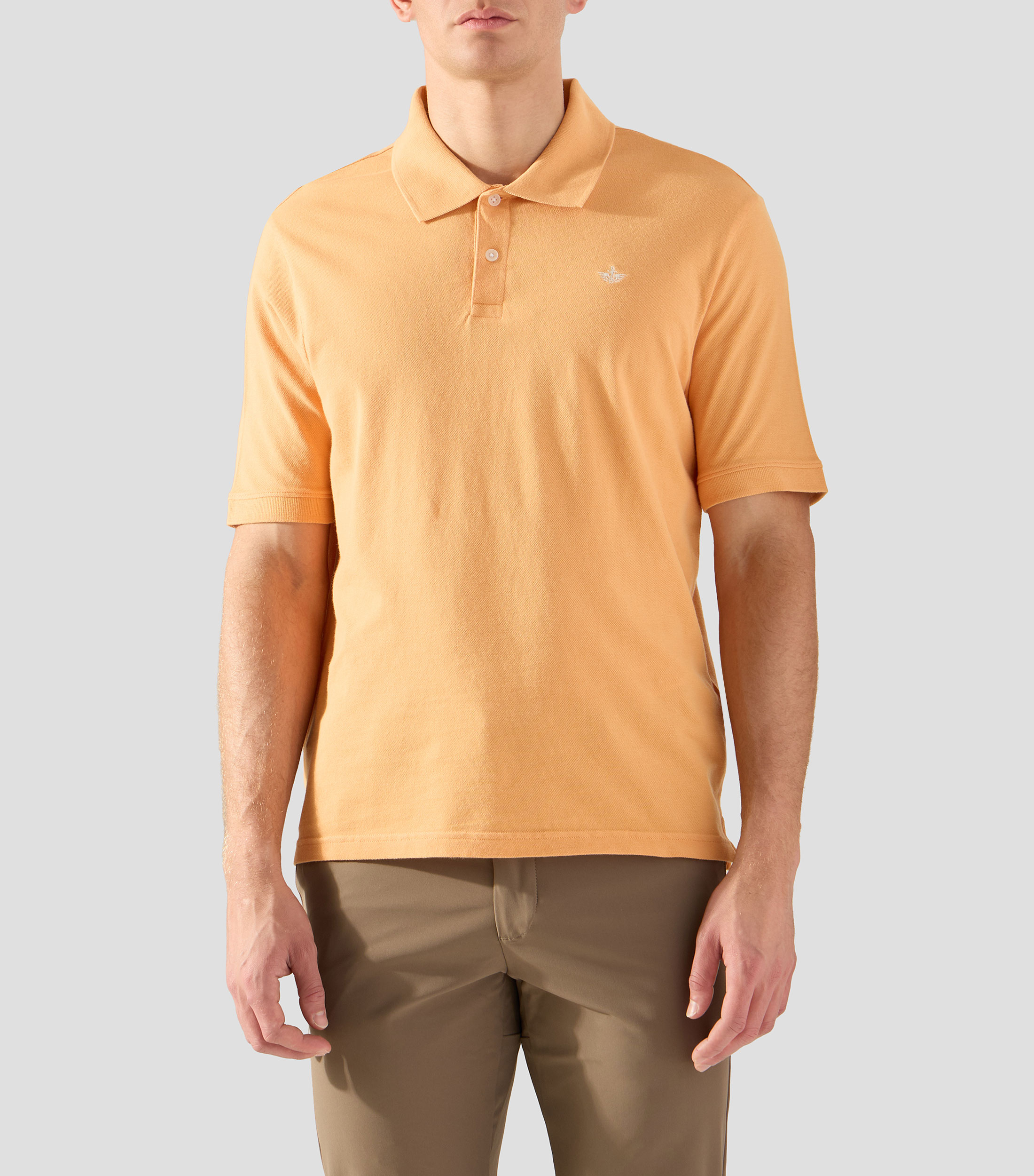 Playera tipo polo con manga corta lisa Hombre